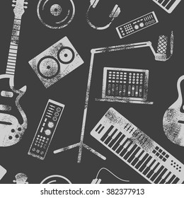 Vector music production seamless pattern. Speaker, laptop, headphones, microphone, amplifier, plate, synthesizer, electric guitar.