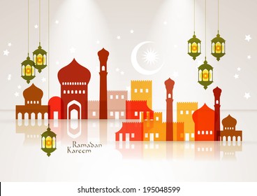 Vector Muslim Mosque and Oil Lamp Graphics. Translation: Ramadan Kareem - May Generosity Bless You During The Holy Month.