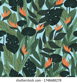 Vector natural beautiful seamless pattern. Tropical flowers and leaves. Repeat background design with strelitzia and monstera.