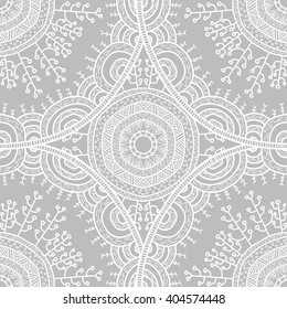 Vector nature seamless pattern with abstract flowers. Vector round mandala in childish style. Ornamental doodle background.
