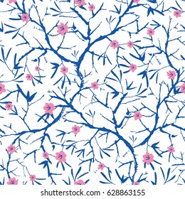 Vector navy blue, pink, and white blooming sakura bracnhes painted texture. Seamless repeat pattern background. Great for wallpaper, cards, fabric, wrapping paper, stationery projects.