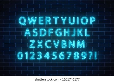 Vector neon style font. Glowing neon alphabet letters on dark brick wall background. You can made your words with it.