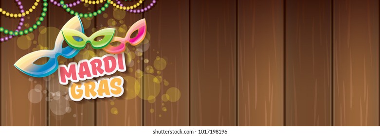 vector new orleans mardi gras vector horizontal banner background with blur lights, carnival mask and text on wooden backdrop. vector mardi gras party or fat tuesday purple poster design template