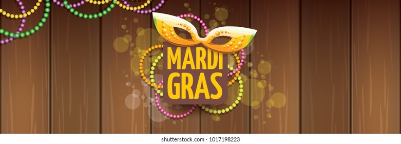 vector new orleans mardi gras vector horizontal banner background with blur lights, carnival mask and text on wooden backdrop. vector mardi gras party or fat tuesday purple poster design template