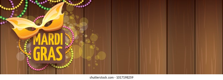 vector new orleans mardi gras vector horizontal banner background with blur lights, carnival mask and text on wooden backdrop. vector mardi gras party or fat tuesday purple poster design template