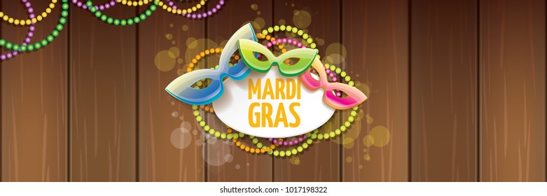 vector new orleans mardi gras vector horizontal banner background with blur lights, carnival mask and text on wooden backdrop. vector mardi gras party or fat tuesday purple poster design template