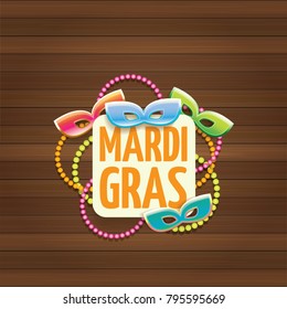 vector new orleans mardi gras carnival label with mask and text on wooden wall background. vector mardi gras party or fat tuesday poster design template with space for text