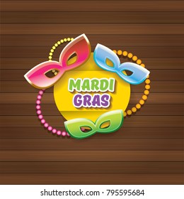 vector new orleans mardi gras carnival label with mask and text on wooden wall background. vector mardi gras party or fat tuesday poster design template with space for text