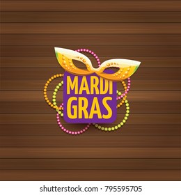 vector new orleans mardi gras carnival label with mask and text on wooden wall background. vector mardi gras party or fat tuesday poster design template with space for text