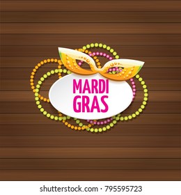 vector new orleans mardi gras carnival label with mask and text on wooden wall background. vector mardi gras party or fat tuesday poster design template with space for text