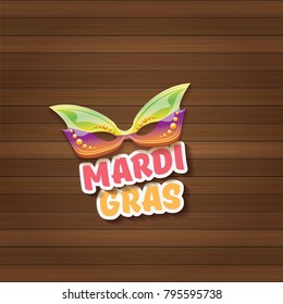 vector new orleans mardi gras carnival label with mask and text on wooden wall background. vector mardi gras party or fat tuesday poster design template with space for text
