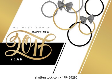 vector new year poster with hand lettering golden label 2017 and christmas ornaments.