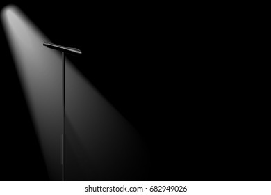 vector no singer, spotlight silhouette microphone on stage, concept is lack of important person
