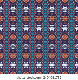 Vector nordic ornament. winter scandinavian seamless pattern, border design for fashion fabric, knit, textile, cross embroidery. Norwegian background with red and blue colors