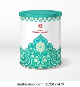 Vector object. Round tin packaging. Tea, coffee, dry products. Beautiful floral border. Imitation of chinese porcelain painting