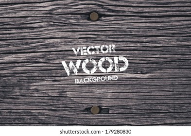 Vector old dry gray wood background with two rusty nails