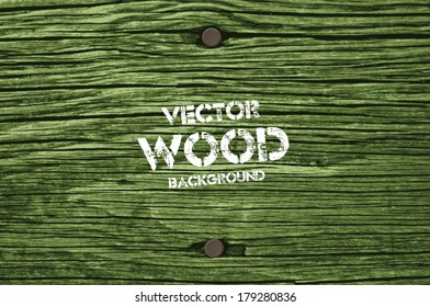Vector old dry green toned wood background with two rusty nails