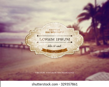 Vector old weathered vintage paper label over a retro photographic blurred bokeh background. Tropical beach theme