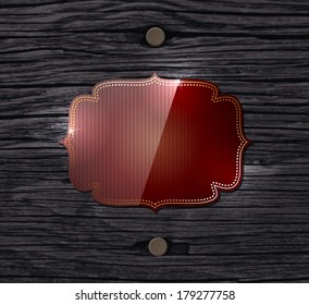 Vector old wood background with two nails and a dark maroon glossy vintage banner