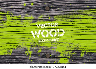 Vector Old Wooden Background Texture With Two Nails And Grungy Bright Green Paint