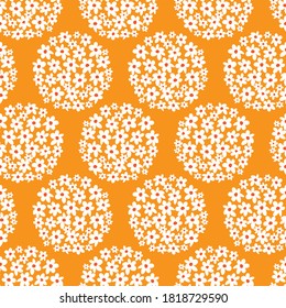 Vector orange fun daisy flowers filled circle shape repeat pattern with orange center. Suitable for textile, gift wrap and wallpaper.