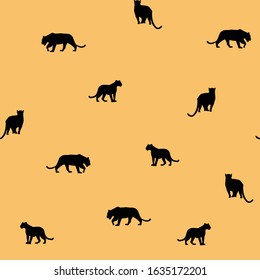 Vector orange seamless graphical pattern with black puma cat. Creative abstract texture for fabric, wrapping, textile, wallpaper, apparel. 