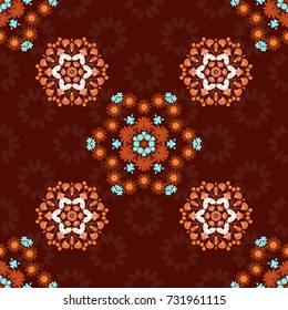 Vector oriental background in saturated colors. Seamless pattern mandala ornament. Vintage decorative elements in brown, magenta and orange colors. Tribal motifs.