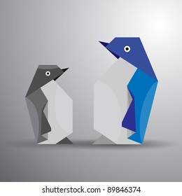 Vector origami couple of penguin