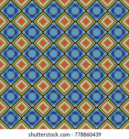 Vector ornament in brown, blue and green colors. Embroidery for fashion textile and fabric. Embroidery seamless pattern with abstract diagonal tiles.