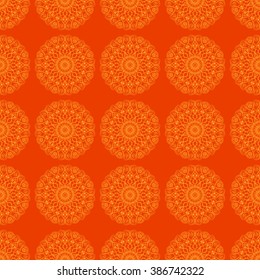 Vector ornament seamless pattern. Orange warm colors. Vector mandala background. Orange seamless. Decorative vintage element. Flower mandala background.