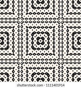 Vector ornamental seamless pattern with geometric elements, squares, rhombuses. Ethnic tribal background texture. Folk motif ornament.  Black and white design element for decor, carpet, fabric, print
