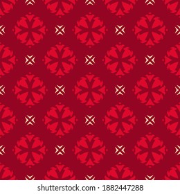 Vector ornamental seamless pattern. Geometric ornament texture with small flower silhouettes, diamonds, crosses. Simple abstract floral background. Red and gold color. Elegant ornate repeat design