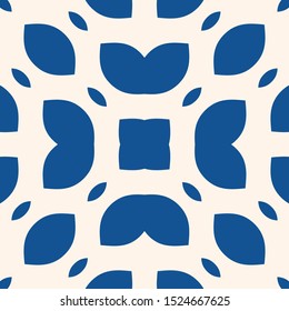 Vector ornamental seamless pattern. Indigo blue tile in traditional mediterranean, spanish, portuguese style. Abstract blue and white mosaic background texture with floral shapes, petals, leaves