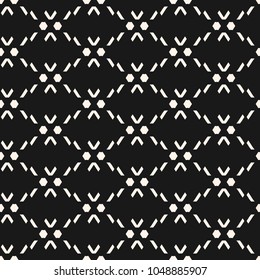 Vector ornamental seamless pattern in traditional ethnic style. Black and white texture. Tribal ornament with simple geometric shapes, grid, lattice, mesh, fabric. Dark abstract folk background design