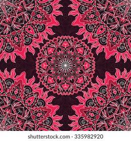 Vector ornate seamless ornament. Oriental pattern of bright pink mandala on a purple background. Template for carpet, shawl, wallpaper, wrapping paper.