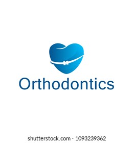 Vector Orthodontics logo. eps10 dental logo in the shape of a heart. Abstract stomatology blue heart icon. Template for orthodontics design isolated on white background