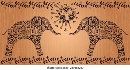 Vector outline illustration of a sleeping and awake elephants. The silhouette of the elephant collected from ornamental elements.