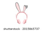 Vector of over-ear headphones or earmuffs in shades of pastel pink and gray with rabbit or bunny ears on top. This cute headset is isolated against a white background.