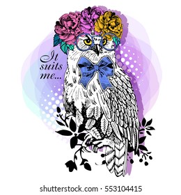 Vector owl with bow, glasses, and wreath with flowers. Hand drawn illustration of dressed owl