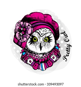 Vector owl in a crimson hat with pink flower. Pretty owlet with necklace.