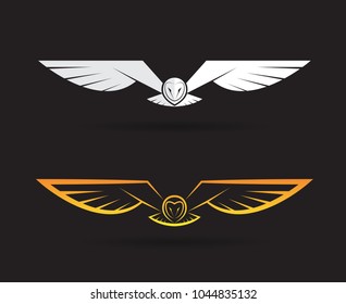 Vector of an owl design on black background. Bird. Animals. Easy editable layered vector illustration.