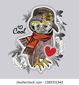 Vector owl with glasses, hat and  scarf. Illustration of dressed bird. Print on T-shirts, bags and and other fashion products. Design children's clothing and accessories.