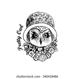 Vector owl in a hat. Bird with bow. White and black.
