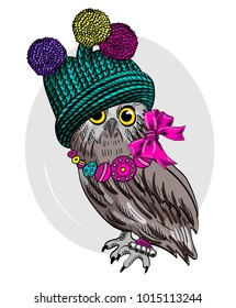 Vector owl with knitted hat with pompon and necklace. Hand drawn illustration of owl. 