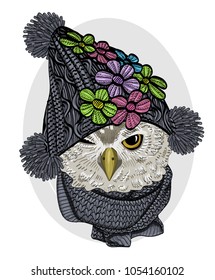 Vector owl with knitted hat and scarf. Hand drawn illustration of dressed owl. 