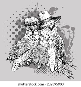 Vector  owls on a branch in a hat with a flower.