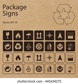 Vector packaging symbols on vector cardboard background. Shipping icon set including recycling, fragile, flammable, this side up, handle with care, keep dry, other symbols. Use on package, carton box.