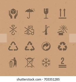 Vector packaging symbols on vector cardboard background