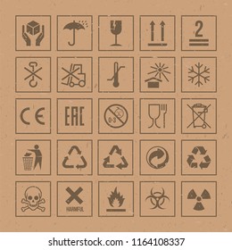 Vector packaging symbols set on cardboard background
