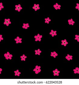 Vector paisley floral pattern. Many flowers in neutral and magenta colors on a black background. Hand-drawn seamless pattern.